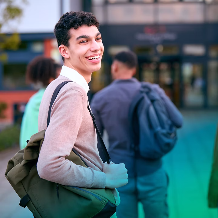 Young man smiling outdoors